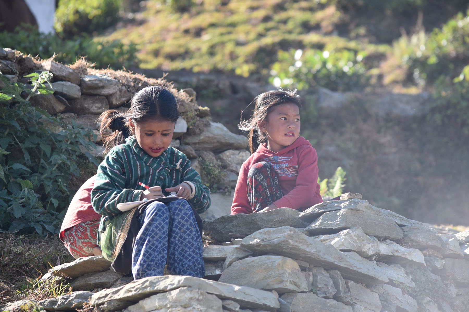 घाम ताप्दै गृहकार्य